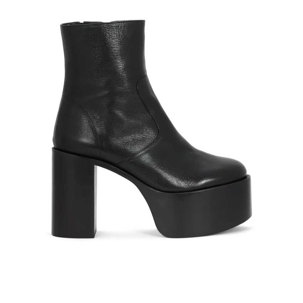 Never worn brand new Simon Miller high raid platforms. Comfortable